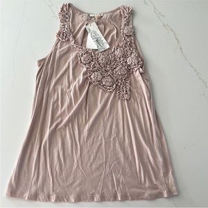 Bundle of 14 women’s tops. Sizes small and medium.